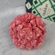 Fresh pasture-raised ground pork on white marble with Maldon sea salt — Wishbone Heritage Farms, South Carolina